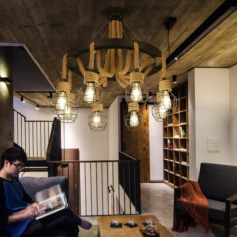Industrial style chandelier in wrought iron and hemp rope