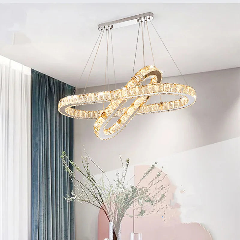 Modern stainless steel chandelier with crystal and LED lighting