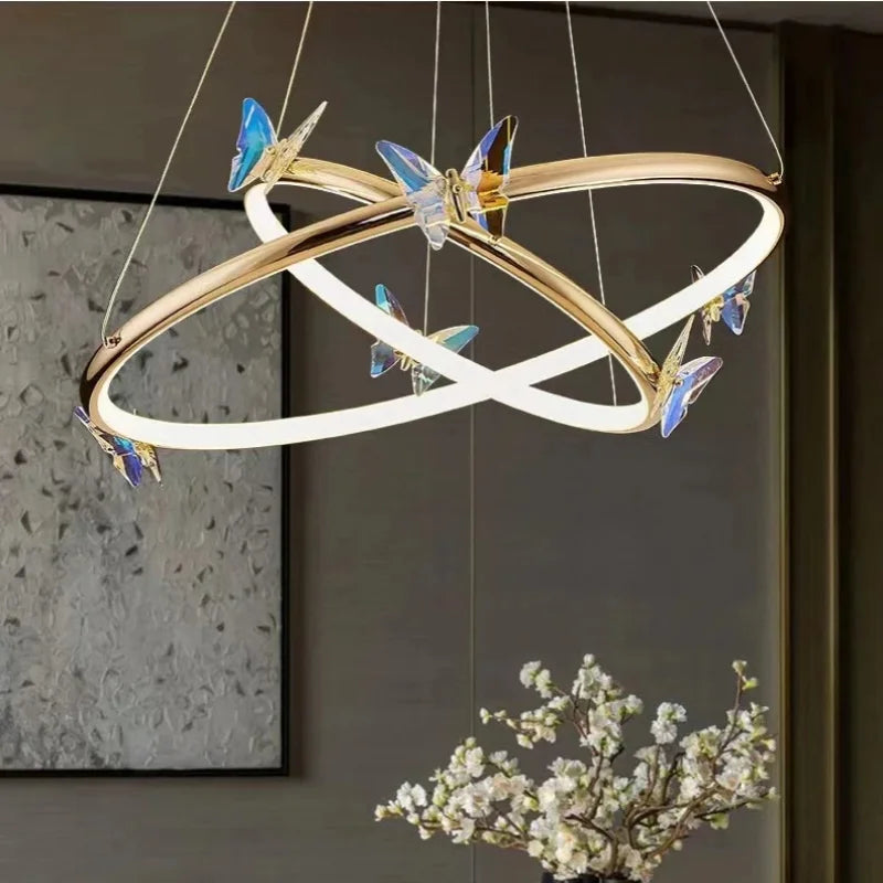 Modern butterfly-shaped chandelier with decorative gold ring