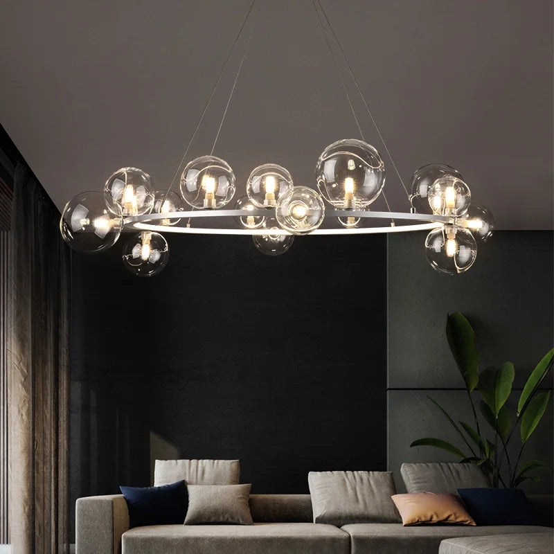 Metal chandelier with glass globe for interior decoration