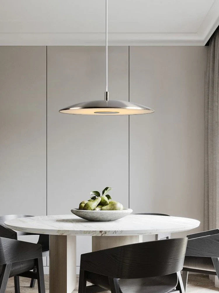 Minimalist flying saucer-shaped circular chandelier