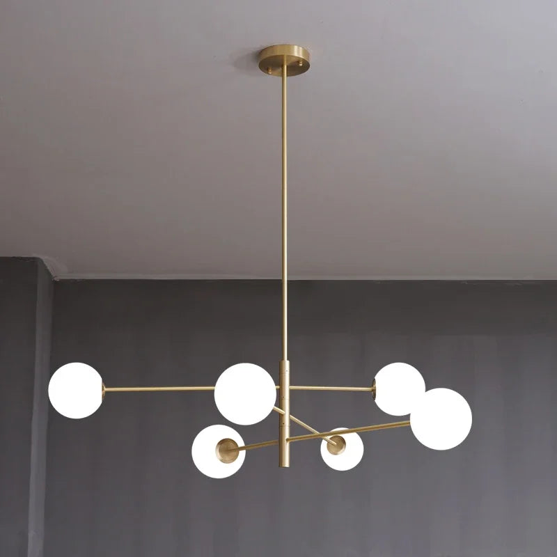 Modern copper LED chandelier with frosted glass globe