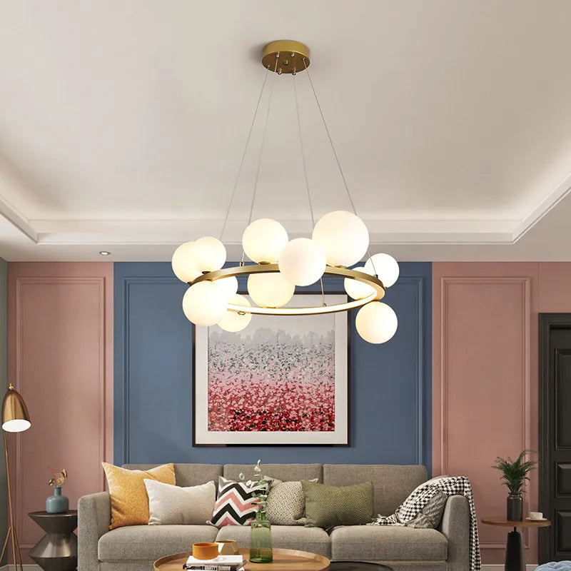 Round designer chandelier with clear glass LED balls