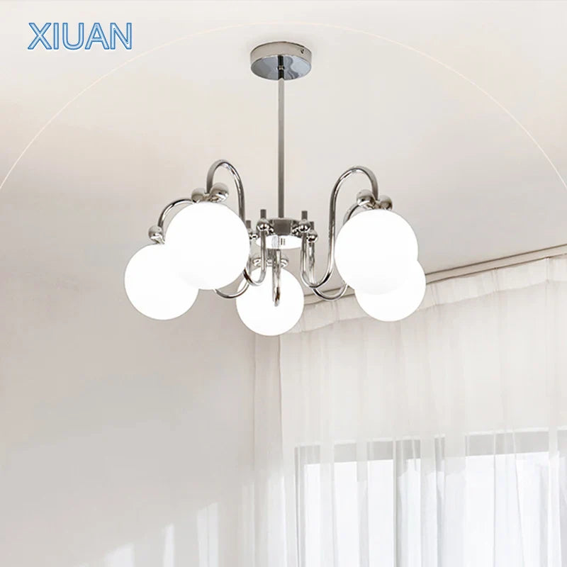 modern chrome chandelier with glass pendant