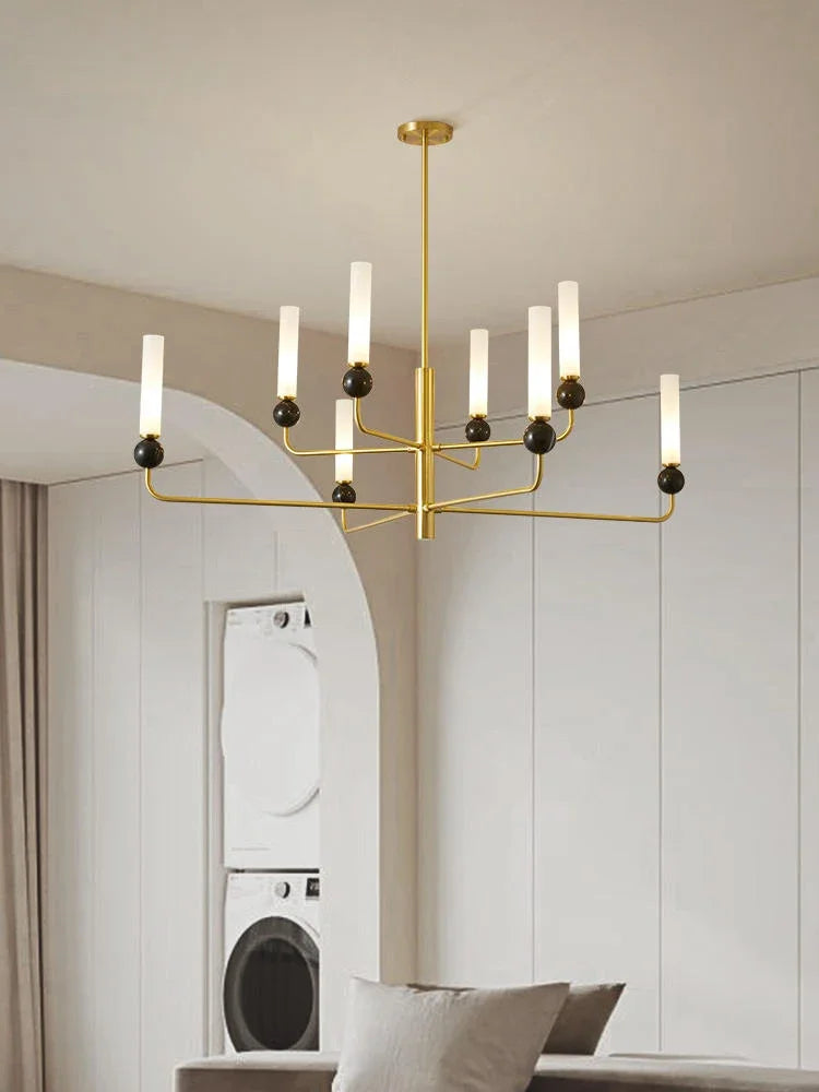 Modern chandelier illuminates with chic design.