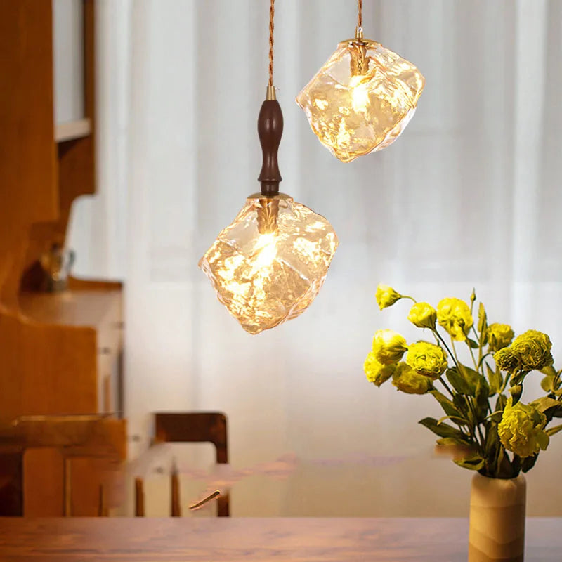 Amber glass hanging chandeliers.